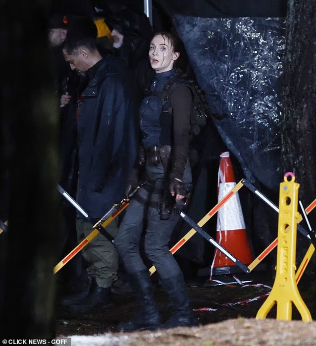 Sophie Turner is spotted filming intense action scenes for Amazon’s Tomb Raider series in Surrey, including a knife fight in heavy rain and a motorcycle escape with Martin Bobb-Semple as Zip.