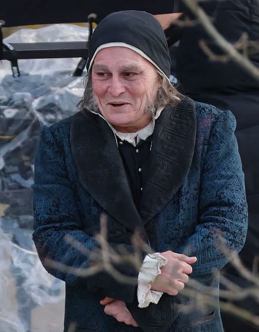 First look images reveal Johnny Depp as Ebenezer Scrooge and Andrea Riseborough as the Ghost of Christmas Past on the London set of Ti West’s Ebenezer: A Christmas Carol.