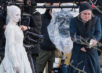 First look images reveal Johnny Depp as Ebenezer Scrooge and Andrea Riseborough as the Ghost of Christmas Past on the London set of Ti West’s Ebenezer: A Christmas Carol.