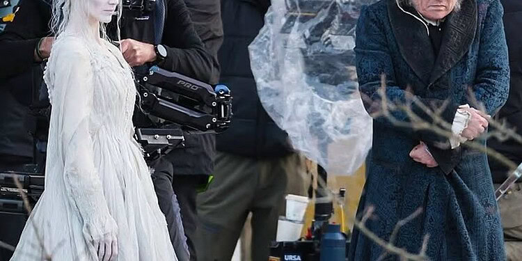 First look images reveal Johnny Depp as Ebenezer Scrooge and Andrea Riseborough as the Ghost of Christmas Past on the London set of Ti West’s Ebenezer: A Christmas Carol.