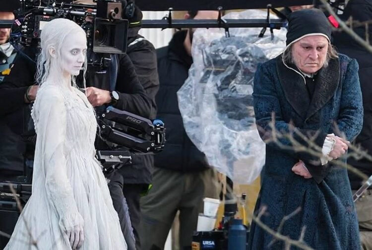 First look images reveal Johnny Depp as Ebenezer Scrooge and Andrea Riseborough as the Ghost of Christmas Past on the London set of Ti West’s Ebenezer: A Christmas Carol.