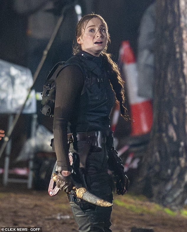 Sophie Turner is spotted filming intense action scenes for Amazon’s Tomb Raider series in Surrey, including a knife fight in heavy rain and a motorcycle escape with Martin Bobb-Semple as Zip.