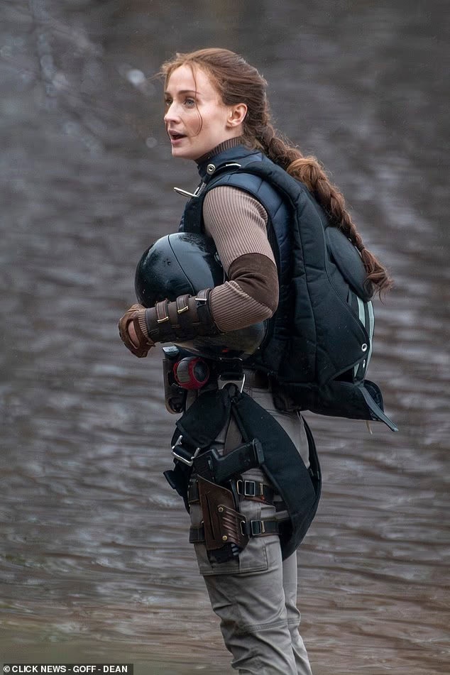 Sophie Turner was spotted on set as Lara Croft while filming Amazon’s upcoming Tomb Raider series in Surrey, England, featuring action scenes and a new take on the iconic costume.