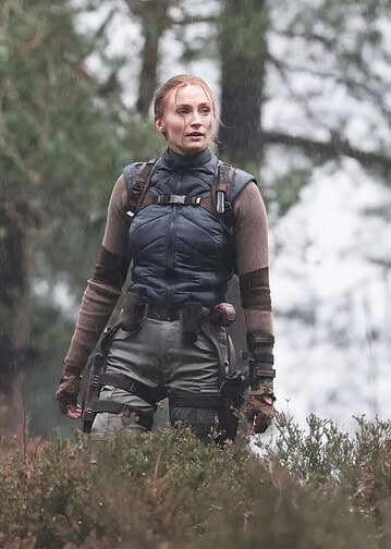 Sophie Turner was spotted on set as Lara Croft while filming Amazon’s upcoming Tomb Raider series in Surrey, England, featuring action scenes and a new take on the iconic costume.
