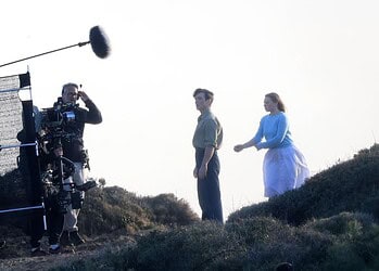 First look at Cillian Murphy and Mia Threapleton on the set of Damien Chazelle’s untitled film in Greece, featuring a prison-set story about a violent guard-inmate conflict.