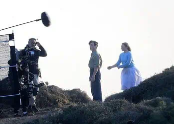 First look at Cillian Murphy and Mia Threapleton on the set of Damien Chazelle’s untitled film in Greece, featuring a prison-set story about a violent guard-inmate conflict.