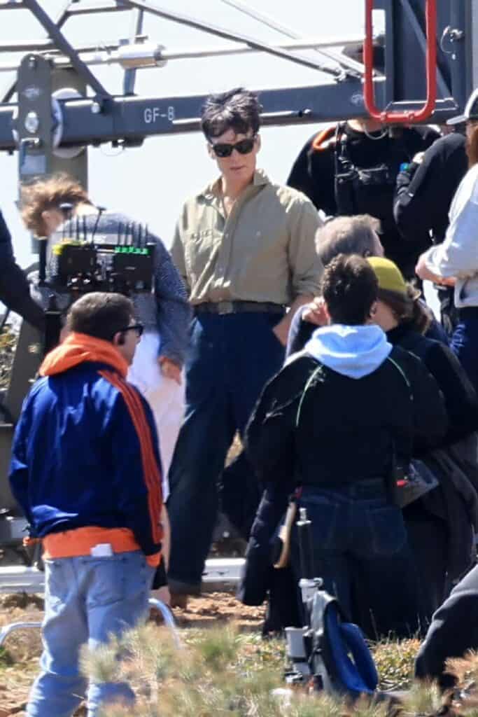 First look at Cillian Murphy and Mia Threapleton on the set of Damien Chazelle’s untitled film in Greece, featuring a prison-set story about a violent guard-inmate conflict.