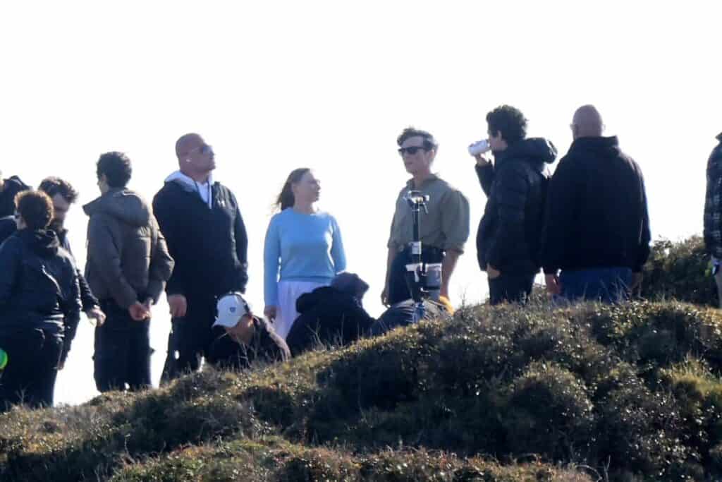 First look at Cillian Murphy and Mia Threapleton on the set of Damien Chazelle’s untitled film in Greece, featuring a prison-set story about a violent guard-inmate conflict.