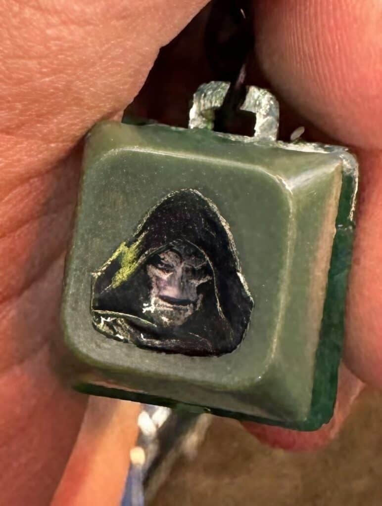 New official merchandise for Avengers: Doomsday reveals a fresh look at Robert Downey Jr.’s Doctor Doom after a keychain image surfaced online.