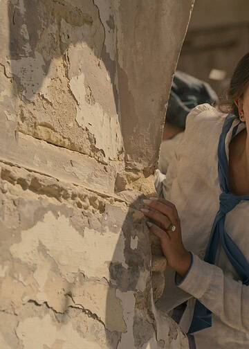 Netflix reveals the first look at Enola Holmes 3, with Millie Bobby Brown and Henry Cavill returning. The sequel premieres July 1 on Netflix.