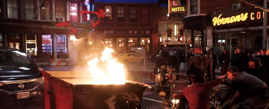 In the practical production teaser, Tom Holland’s Spider-Man is seen on the streets alongside practical car explosions, which were a major part of the filming. The teaser also includes a shot featuring Michael Mando’s Scorpion.