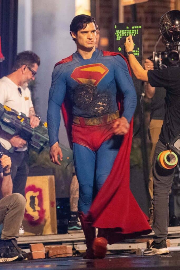 New Man of Tomorrow set photos reveal David Corenswet's battle-damaged Superman and Nicholas Hoult's armored Lex Luthor filming a major fight scene.