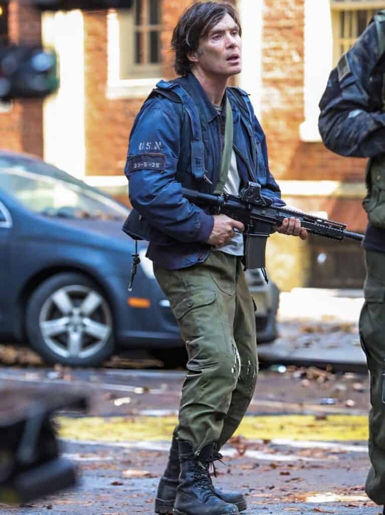 Cillian Murphy has been spotted filming A Quiet Place Part III in New York City, with new set photos showing Emmett in military gear and teasing a major look into his past.