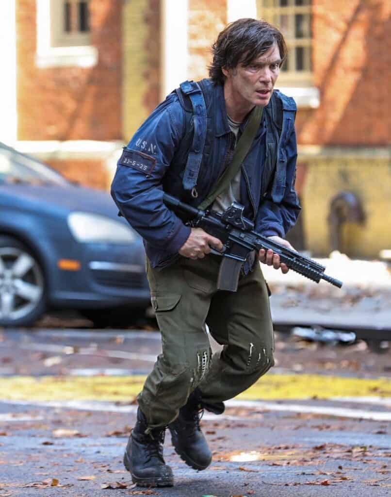 Cillian Murphy has been spotted filming A Quiet Place Part III in New York City, with new set photos showing Emmett in military gear and teasing a major look into his past.