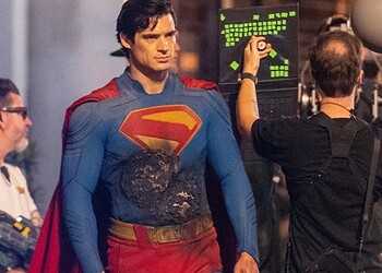 New Man of Tomorrow set photos reveal David Corenswet's battle-damaged Superman and Nicholas Hoult's armored Lex Luthor filming a major fight scene.
