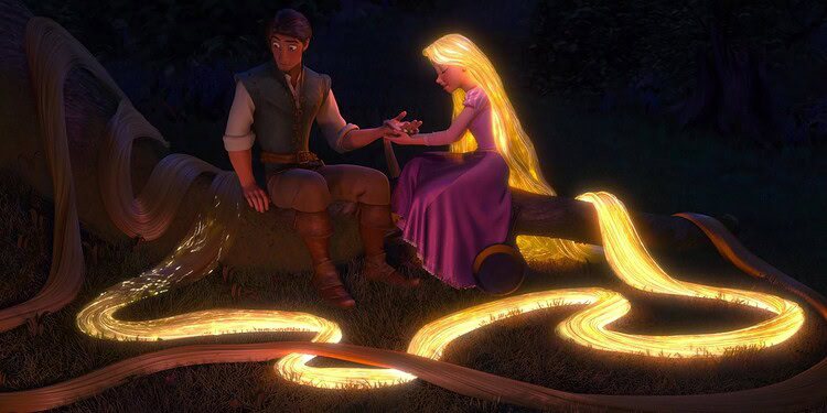 Disney's live-action Tangled set photos reveal the first look at Teagan Croft as Rapunzel and Milo Manheim as Flynn Rider as filming continues in Spain.