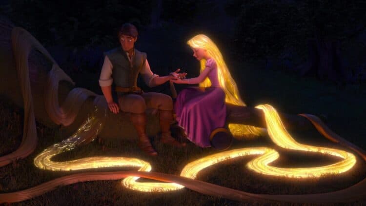 Disney's live-action Tangled set photos reveal the first look at Teagan Croft as Rapunzel and Milo Manheim as Flynn Rider as filming continues in Spain.