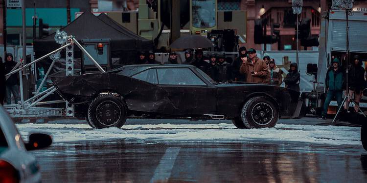 New The Batman: Part II set images and footage show the Batmobile performing stunts in artificial snow during filming in Glasgow.