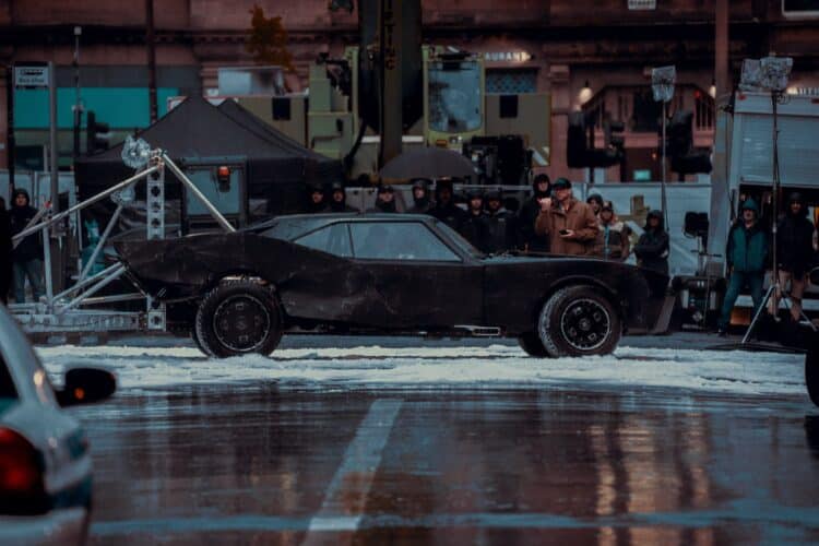 New The Batman: Part II set images and footage show the Batmobile performing stunts in artificial snow during filming in Glasgow.