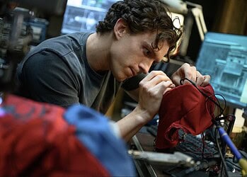 Tom Holland could earn over $100 million for Spider-Man: Brand New Day as the film crosses $2 billion worldwide, with an uncapped backend bonus.