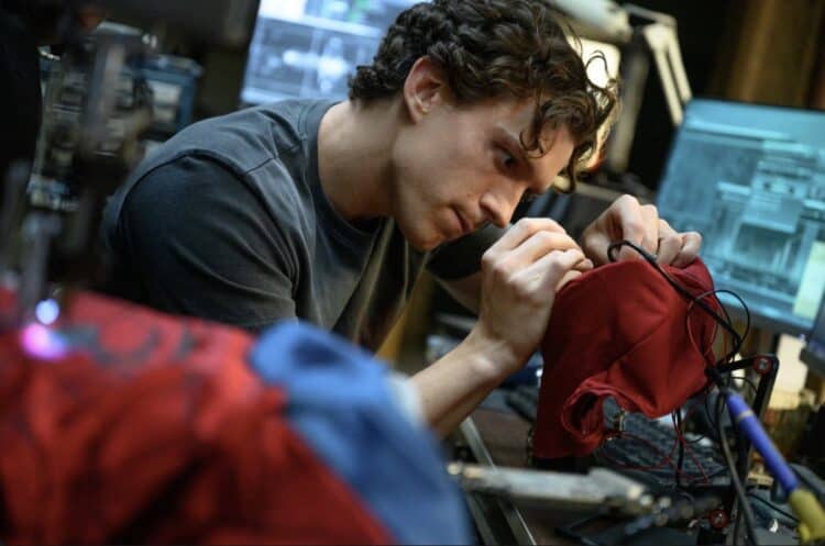 Tom Holland could earn over $100 million for Spider-Man: Brand New Day as the film crosses $2 billion worldwide, with an uncapped backend bonus.