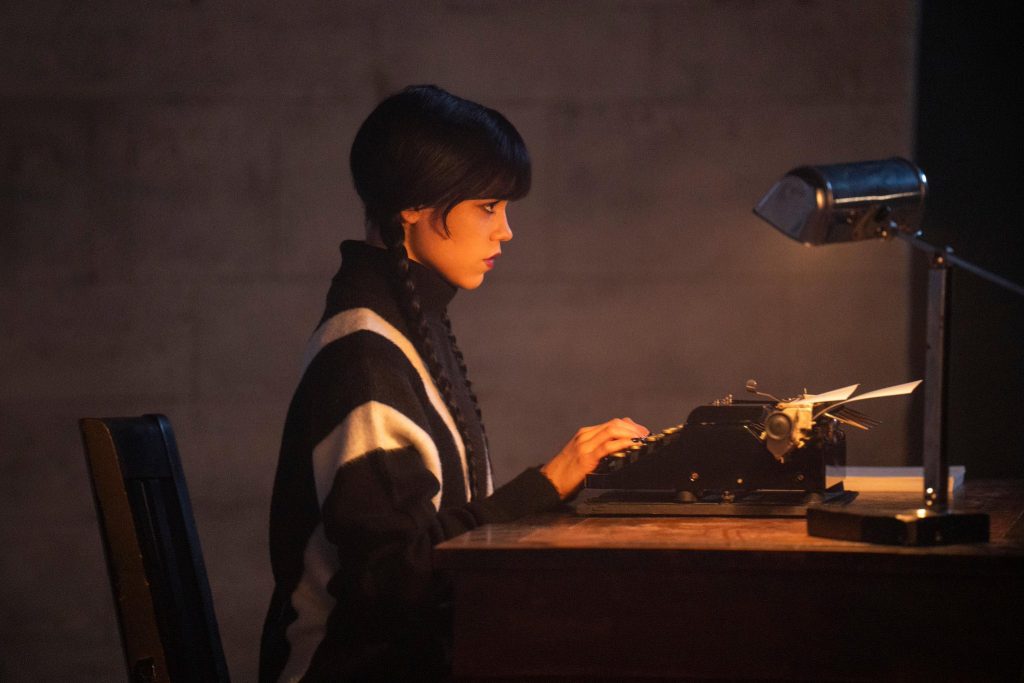Wednesday Season 3 has officially wrapped filming. Netflix reveals a first look at Jenna Ortega, with new characters and locations teased.