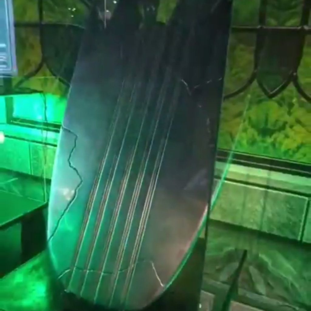 Marvel reveals Doctor Doom’s lab at New York Comic Con, featuring a symbiote sample, Silver Surfer’s split board, Ultron’s head, and Thanos’s broken helmet.