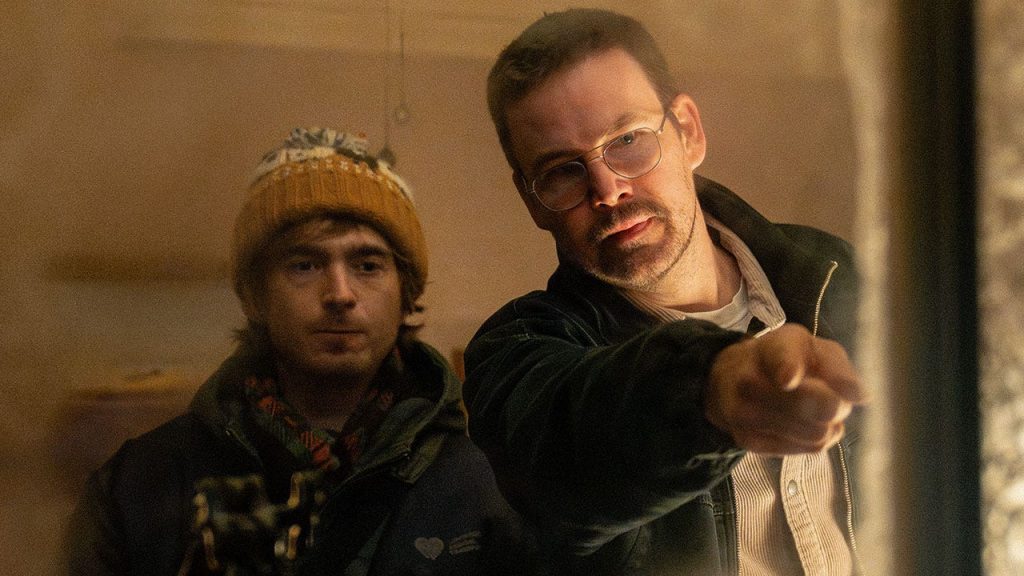 Austin Abrams discusses Resident Evil’s dark and tragic ending, Bryan’s fate, and Zach Cregger’s risky decision to kill a character audiences root for.